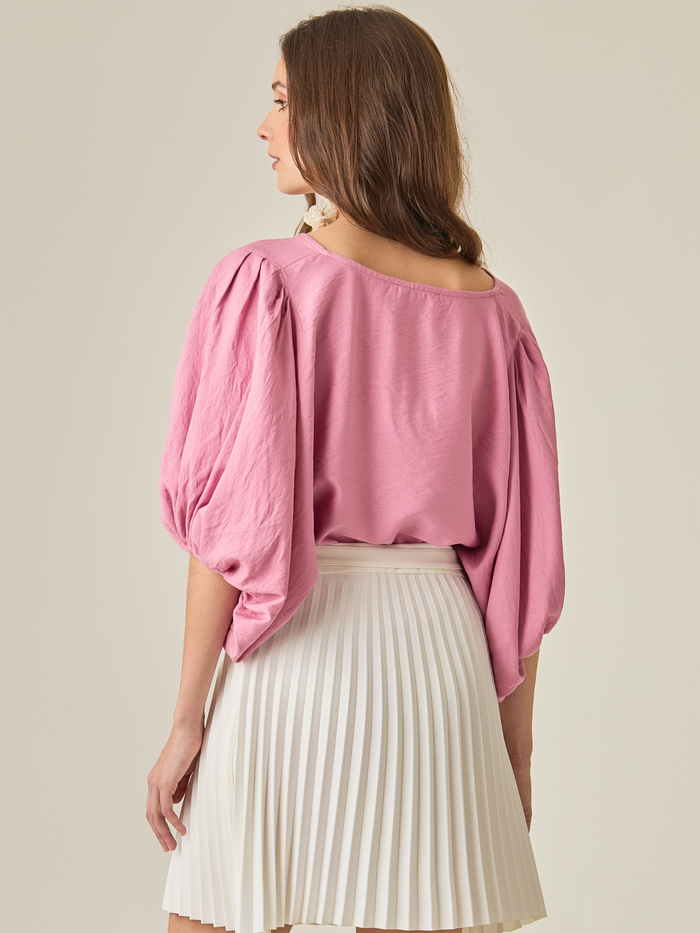 Blusa Capani color rosa con corte cómodo y tejido suave