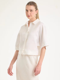 Blusa Genoveva Sand con manga suelta y diseño elegante para mujer.