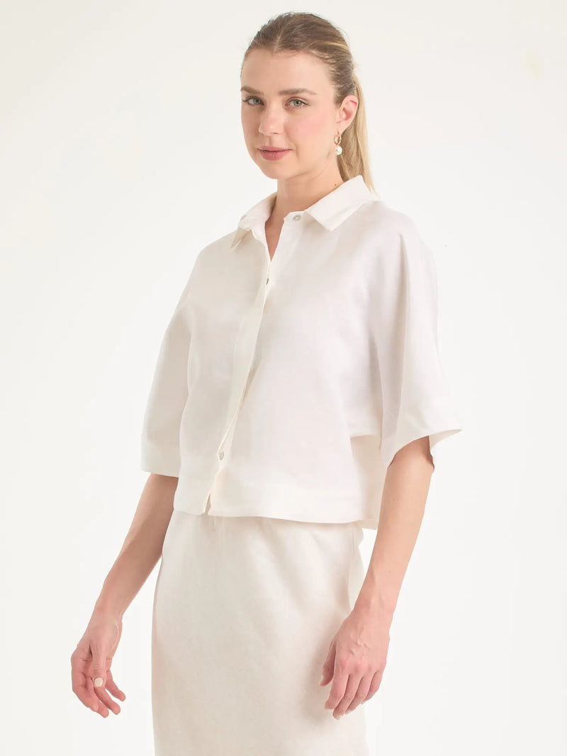 Blusa Genoveva Sand con manga suelta y diseño elegante para mujer.