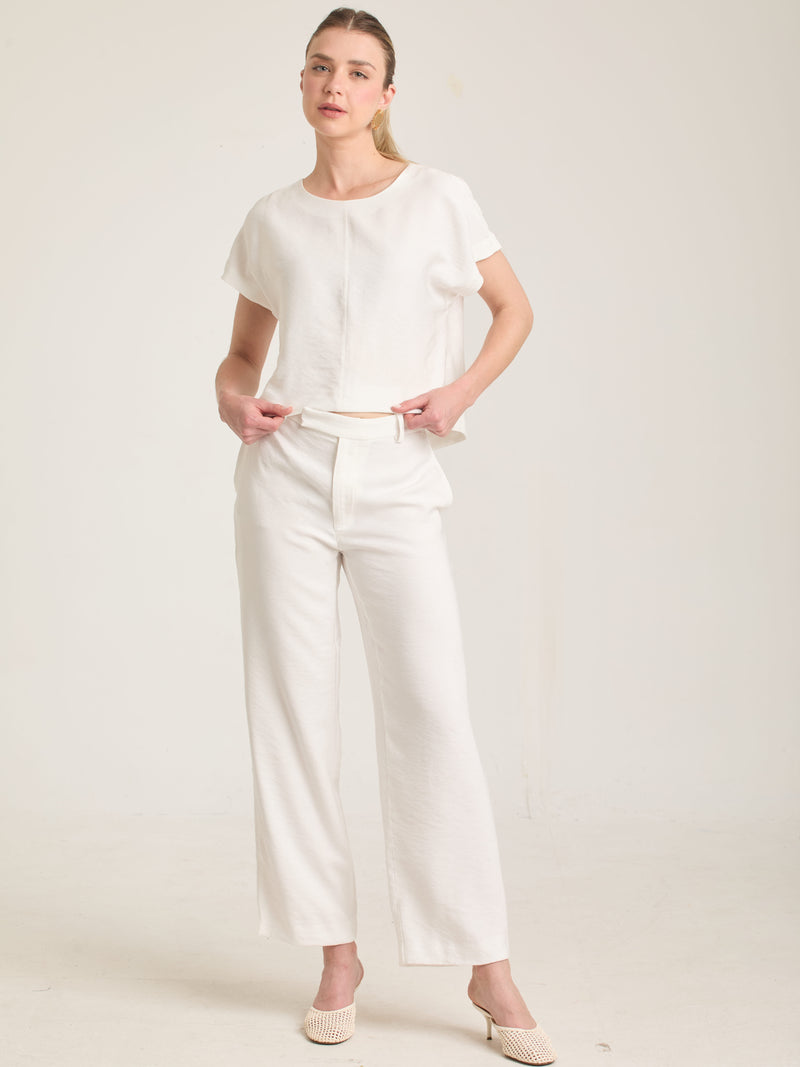 Pantalón Bonne Blanco para mujer con pierna recta y diseño minimalista en tono blanco.