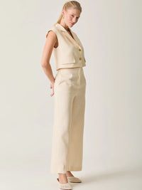 Pantalón Largo Rebe Crema largo y versátil para mujer con diseño neutro y favorecedor.