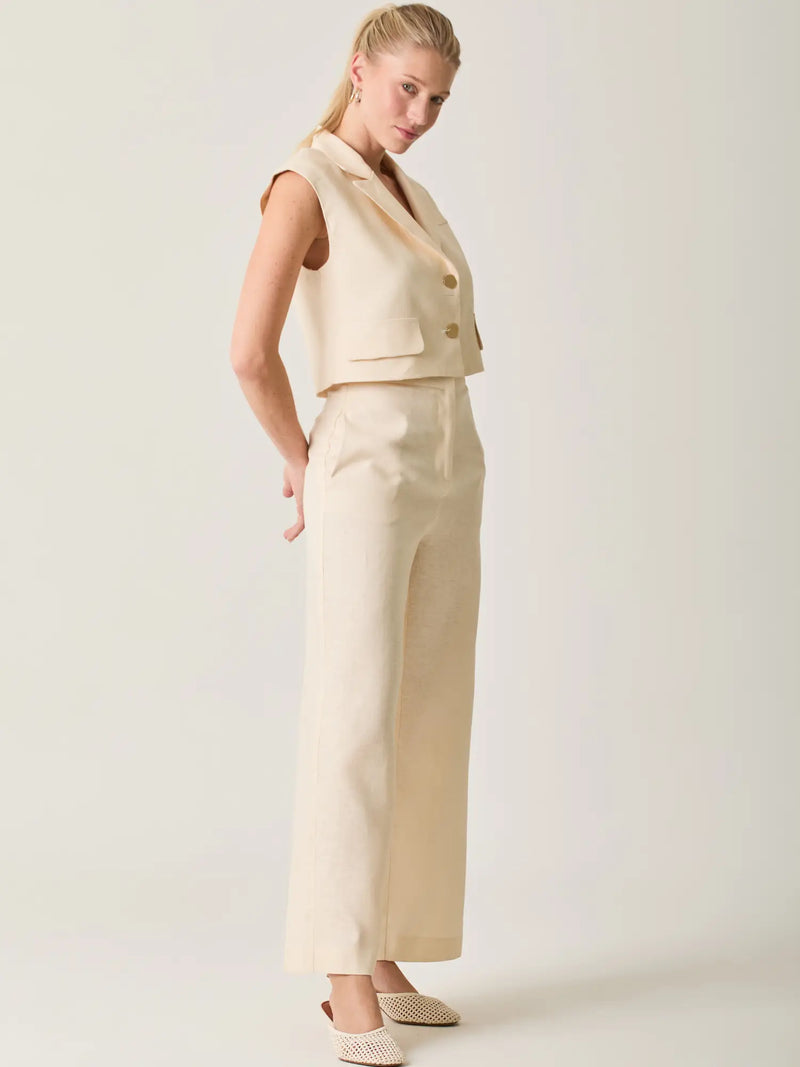 Pantalón Largo Rebe Crema largo y versátil para mujer con diseño neutro y favorecedor.